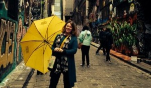 Fiona in Hosier Lane with Hidden Secrets Tours yellow umbrella